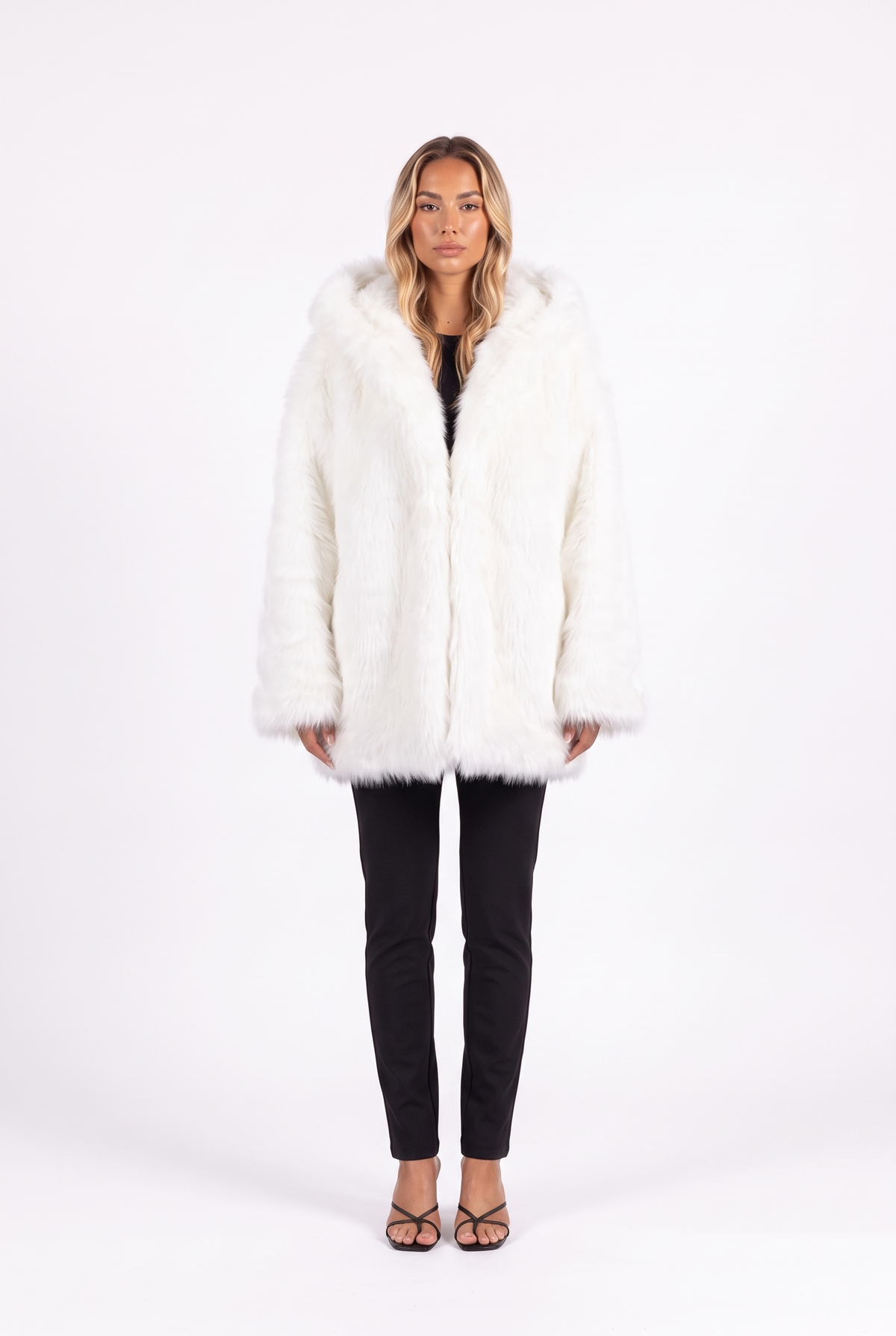 Oversized shaggy faux fur hooded coat in white — front